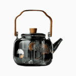 Tetera de vidrio diseño hojas con detalles de madera