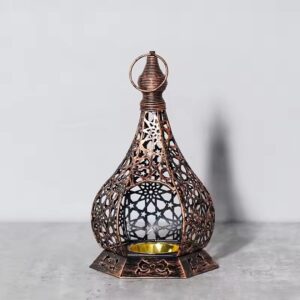 Portavela metalico color cobre forma botella