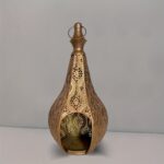 portavelas metalico figura de botella