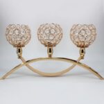Portavelas triple de metal con diamantes